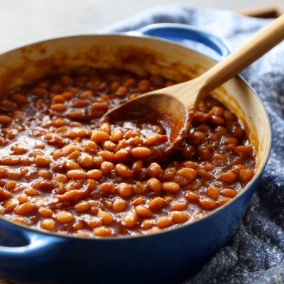 A bowl of baked beans.
