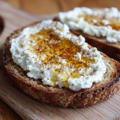 Ricotta toast with a drizzle of honey.