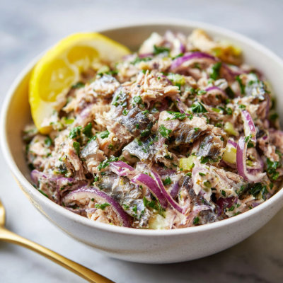 A can of sardines in olive oil.