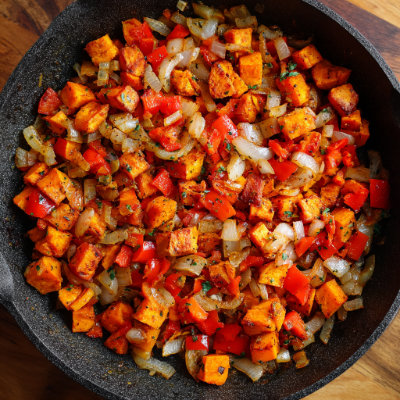 A skillet with sweet potato hash.